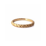 Quilted band crafted in 14KT yellow gold.