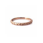 Quilted band crafted in 14KT rose gold. 