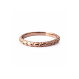 Quilted band crafted in 14KT rose gold.