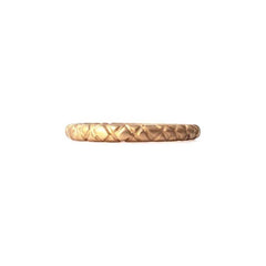 Quilted band crafted in 14KT yellow gold.