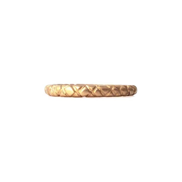 Quilted band crafted in 14KT yellow gold.