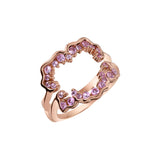 Crafted in 14KT Canadian Certified Gold, this ladies engagement ring features a large circle like shape set with pink sapphires.