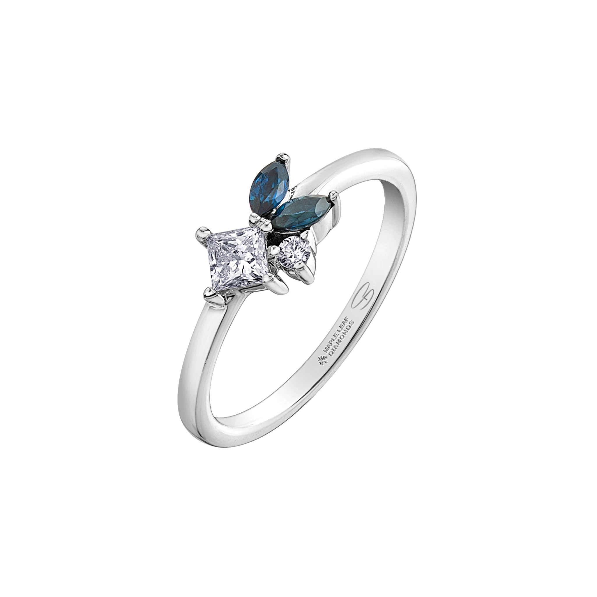 Crafted in 14KT Canadian Certified Gold, this diamond ring is set with two petal-shaped sapphires and princess cut & round brilliant cut Canadian diamonds.