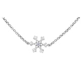 Crafted in 14KT white Canadian Certified Gold, this bracelet features a snowflake pendant with a round brilliant-cut Canadian centre diamond.
