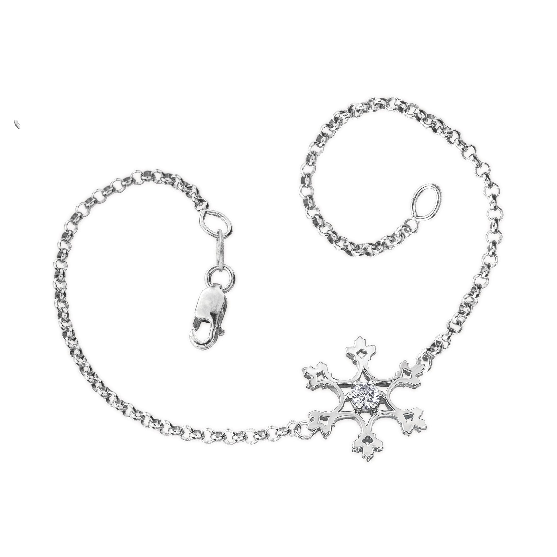 Crafted in 14KT white Canadian Certified Gold, this bracelet features a snowflake pendant with a round brilliant-cut Canadian centre diamond.