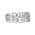 Crafted in 14KT white Certified Canadian Gold, this bracelet features a sprout-inspired swirling design set with round brilliant-cut Canadian diamonds.