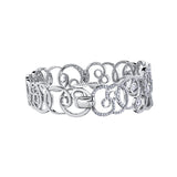 Crafted in 14KT white Certified Canadian Gold, this bracelet features a sprout-inspired swirling design set with round brilliant-cut Canadian diamonds.