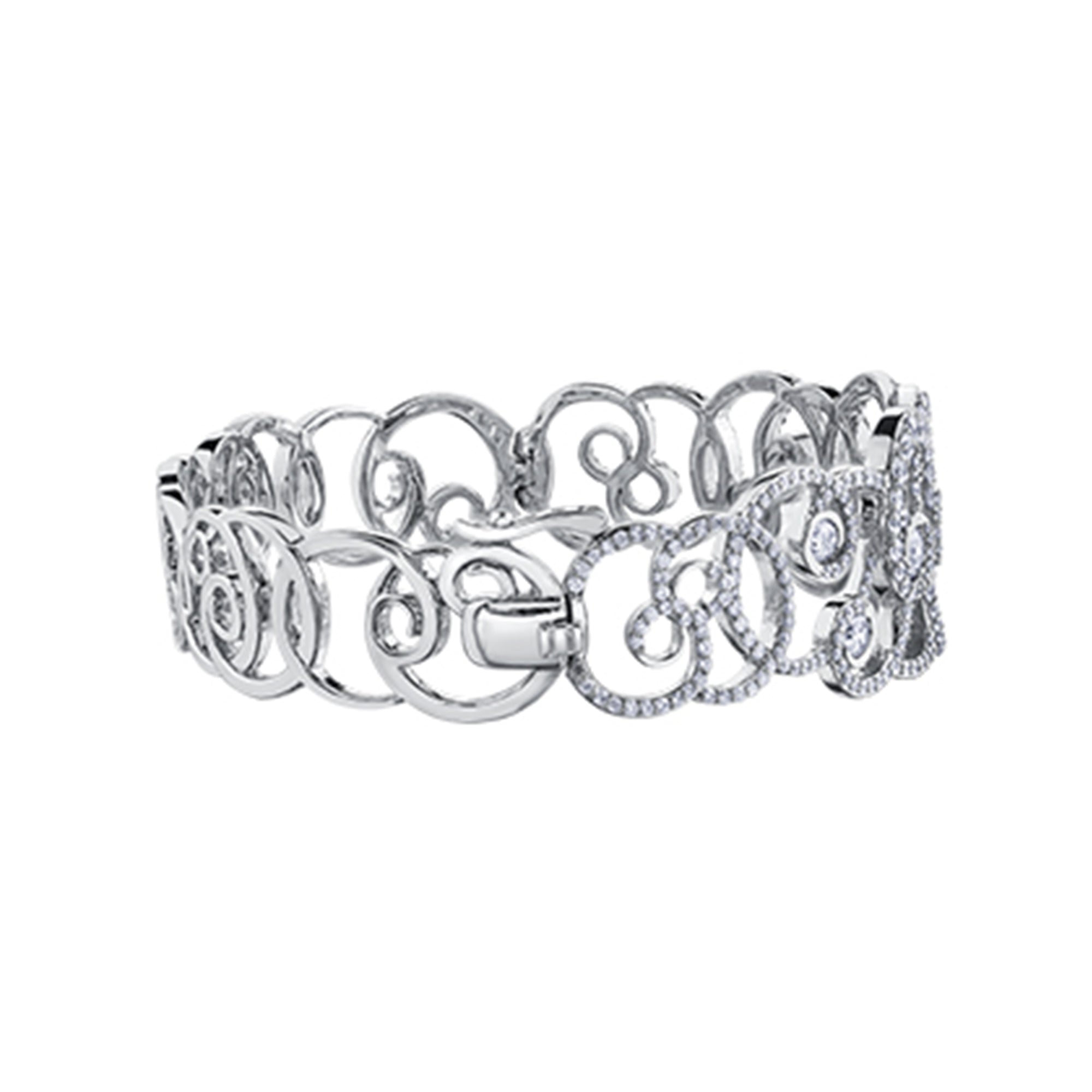 Crafted in 14KT white Certified Canadian Gold, this bracelet features a sprout-inspired swirling design set with round brilliant-cut Canadian diamonds.