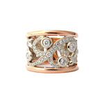 Crafted in 14KT white and rose gold, this ring features a diamond-set vine design with fleur de lys.