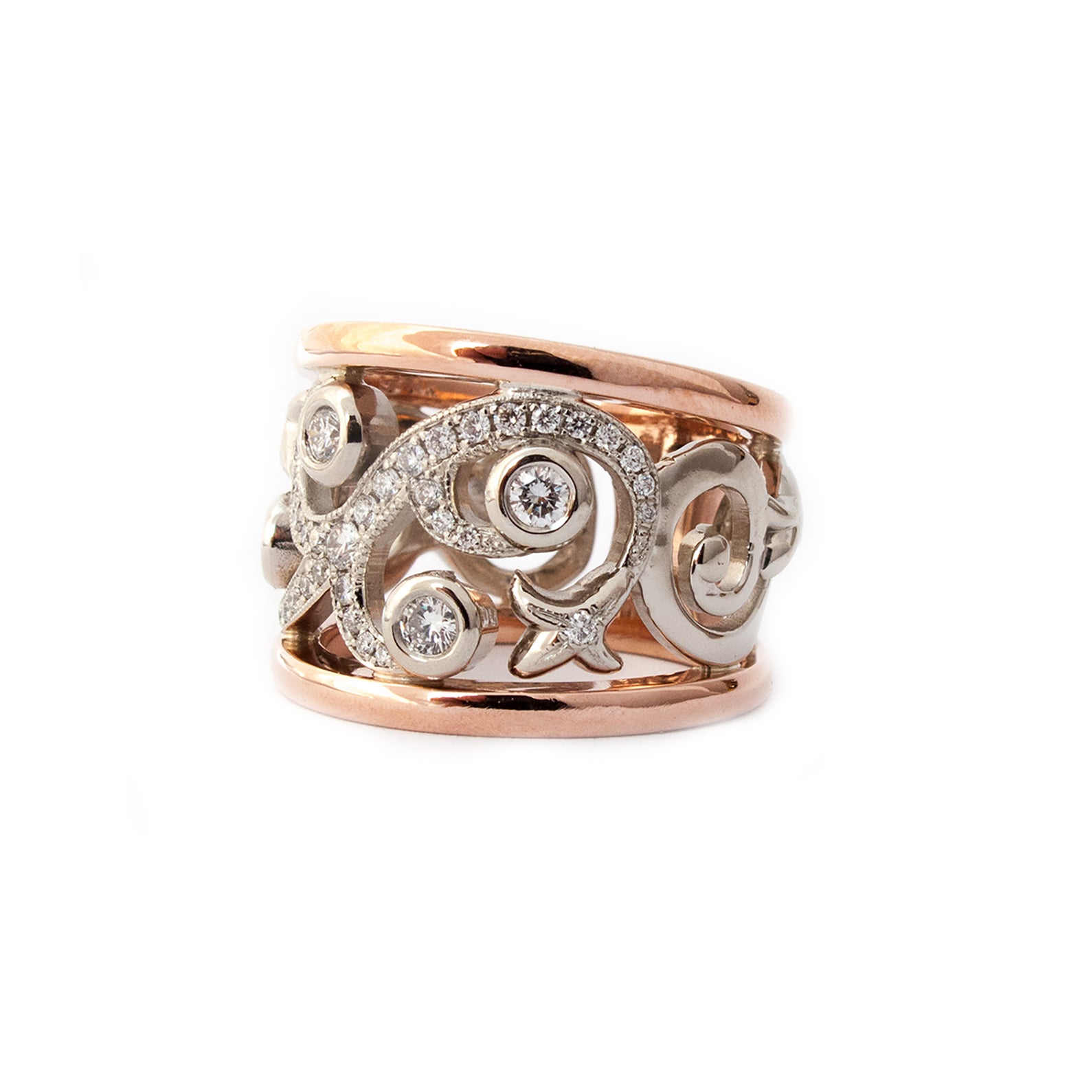 Crafted in 14KT white and rose gold, this ring features a diamond-set vine design with fleur de lys. 