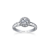 Crafted in 18kt Pure White™, this engagement ring features a melee diamond fur-trim halo with a round brilliant-cut Canadian centre diamond on a quilted band.