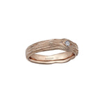 Crafted in 14KT rose Certified Canadian Gold, this men’s ring features a round brilliant-cut Canadian diamond set on a driftwood-inspired band. 