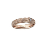 Crafted in 14KT rose Certified Canadian Gold, this men’s ring features a round brilliant-cut Canadian diamond set on a driftwood-inspired band.