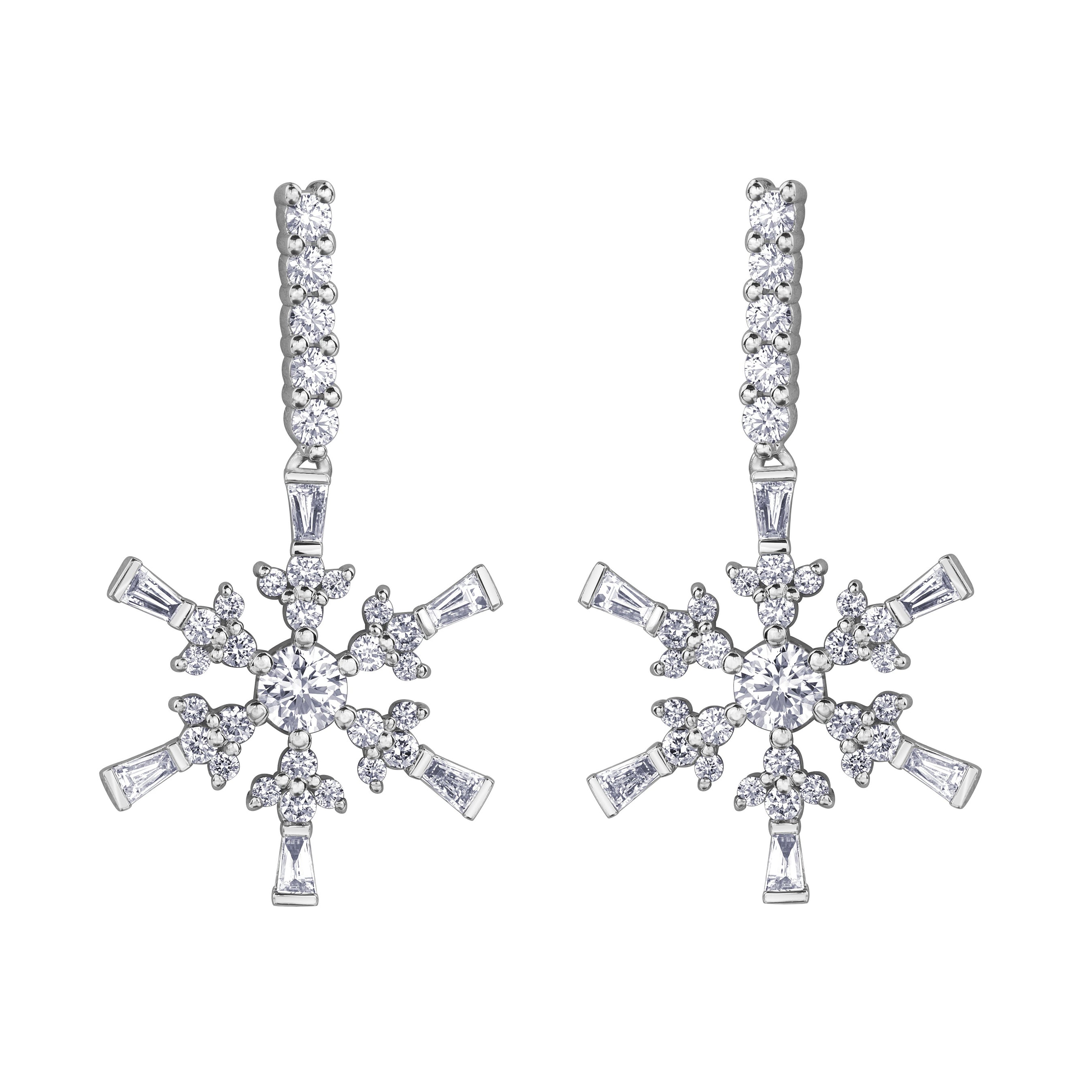 Crafted in 14KT white Certified Canadian Gold, these  dangling earrings each feature a snowflake set with round brilliant-cut Canadian diamonds.