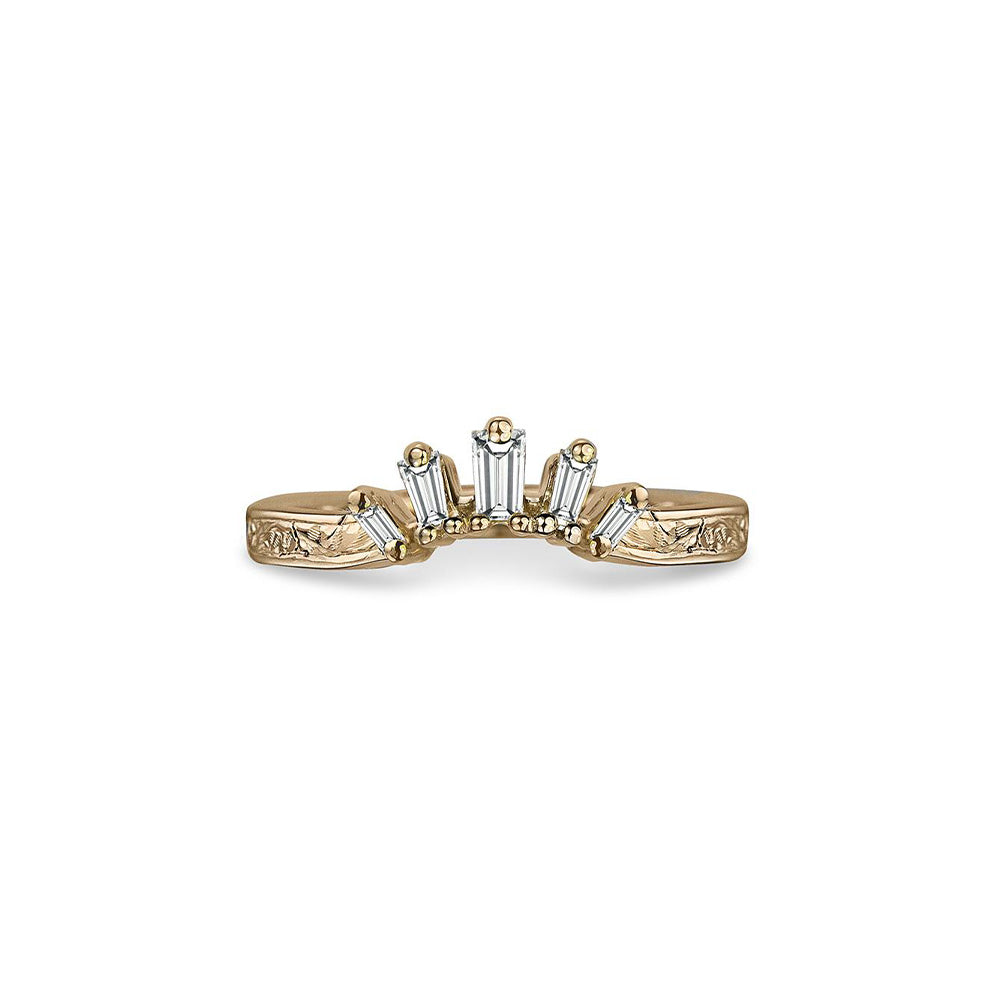 Crafted in 14KT yellow gold, this crown inspired ring features 5 tapered baguette diamonds in a row on a vintage-inspired hand engraved band.