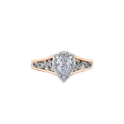Crafted in 18KT white and rose Certified Canadian Gold, this engagement ring features a diamond halo with a pear-shaped Canadian centre diamond on a diamond set band with a rose vine design.
