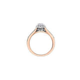 Crafted in 18KT white and rose Certified Canadian Gold, this engagement ring features a diamond halo with a pear-shaped Canadian centre diamond on a diamond set band with a rose vine design.