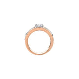 Crafted in rose and white 18KT Certified Canadian Gold, this engagement ring features a diamond set rose vine design with a round brilliant-cut Canadian centre diamond.