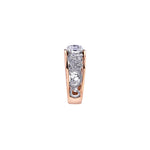 Crafted in rose and white 18KT Certified Canadian Gold, this engagement ring features a diamond set rose vine design with a round brilliant-cut Canadian centre diamond.