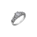 Crafted in 18kt Pure White™, this diamond set rose vine engagement ring features an oval-cut Canadian centre diamond in a diamond set halo.
