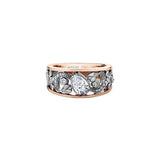 Crafted in 18kt Pure White™ and rose 18KT Certified Canadian Gold, this engagement ring features a diamond set rose vine design with a tilted pear shape Canadian centre diamond.