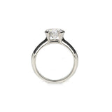 Crafted in 14KT white gold, this ring features a round-cut diamond in a half-bezel setting.