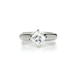 Crafted in 14KT white gold, this ring features a princess-cut diamond in a diagonal prong setting.