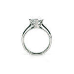 Crafted in 14KT white gold, this ring features a princess-cut diamond in a diagonal prong setting.