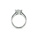 Crafted in 14KT white gold, this ring features a princess-cut diamond in a diagonal prong setting.