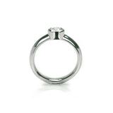 Crafted in 14KT white gold, this ring features a bezel set round brilliant-cut diamond.