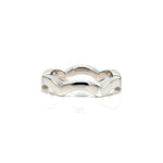 Scallop pattern flat band crafted in 14KT white gold.