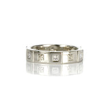 Crafted in 14KT white gold, this ring features six raised sections, each set with a princess-cut diamond. Alternating with hand-engraved orange blossoms in square settings.