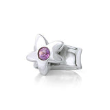 Crafted in sterling silver, this ring features a large flower with an amethyst centre.