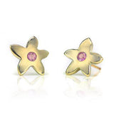 Crafted in 14KT yellow gold, these stud earrings each feature a flower with a pink sapphire centre.