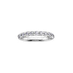 Crafted in 18kt Pure White™, this band is set with round brilliant-cut Canadian diamonds.