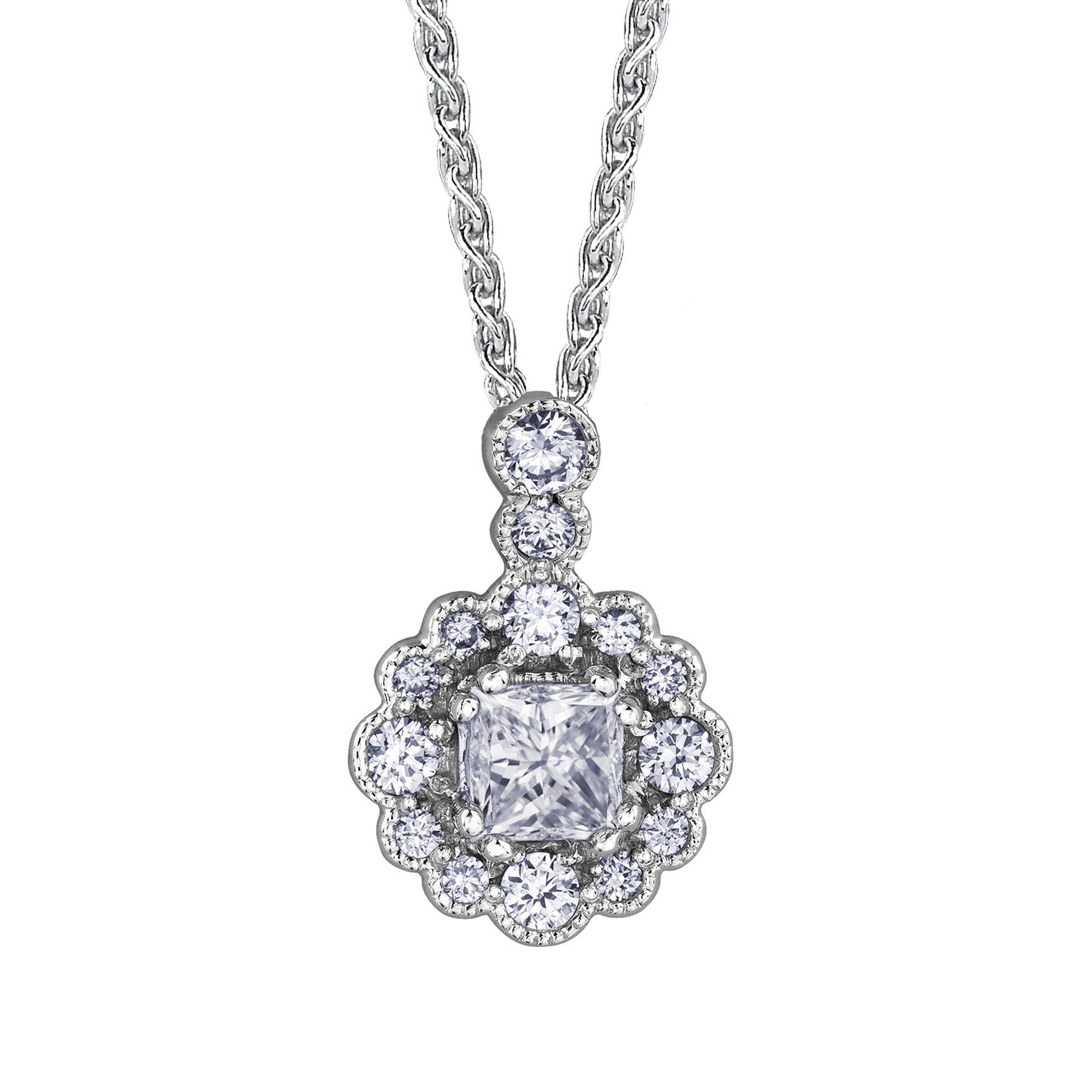 Crafted in 14KT white Certified Canadian Gold, this pendant features a diamond-set snowflake halo with a princess-cut Canadian centre diamond and a diamond-set bail.