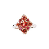Crafted in 14KT rose and white gold, this ring features round and oval-cut orange and red sapphires set in a diamond shape.
