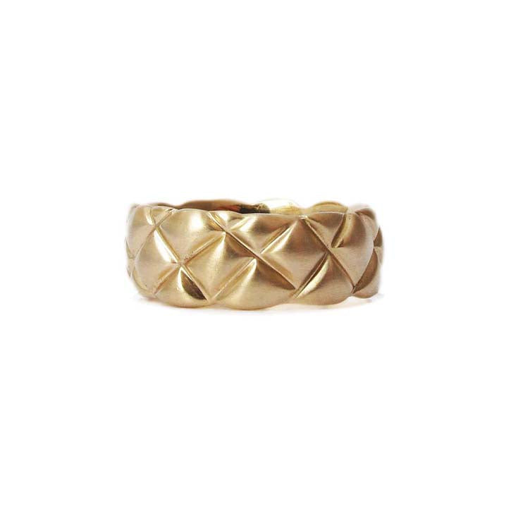7mm quilted band crafted in 14KT yellow gold.