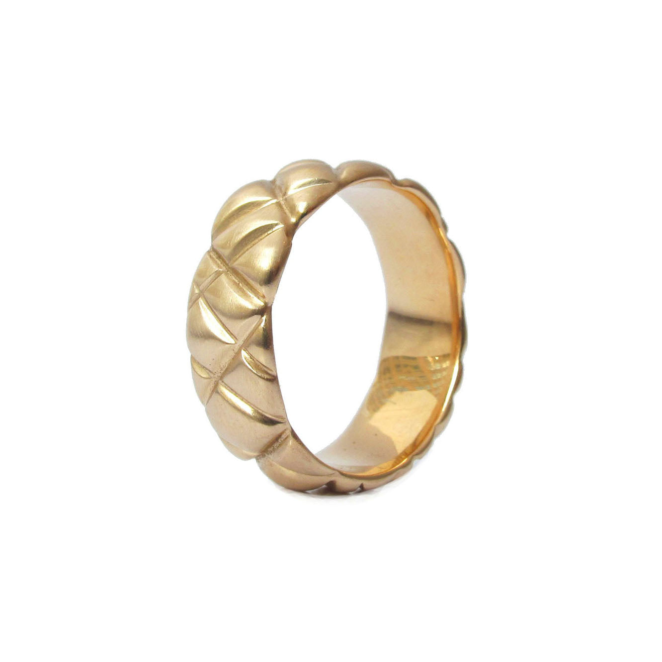 7mm quilted band crafted in 14KT yellow gold. 