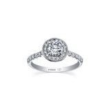 Crafted in 18KT Certified Canadian Gold, this ring features a diamond set halo with a round brilliant-cut Canadian centre  diamond on a diamond set band.