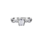 Crafted in 18kt Pure White™, this engagement ring features an emerald-cut Canadian centre diamond on a diamond set infinity symbol-inspired band.