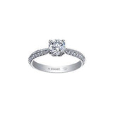 Crafted in 18kt Pure White™, this engagement ring features a round brilliant-cut Canadian diamond cradled by 4-petal water lily flower on a diamond set band.