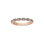 Crafted in 18KT rose gold, this lily of the valley flower-inspired band is set with Canadian diamonds.