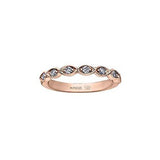 Crafted in 18KT rose gold, this lily of the valley flower-inspired band is set with Canadian diamonds.