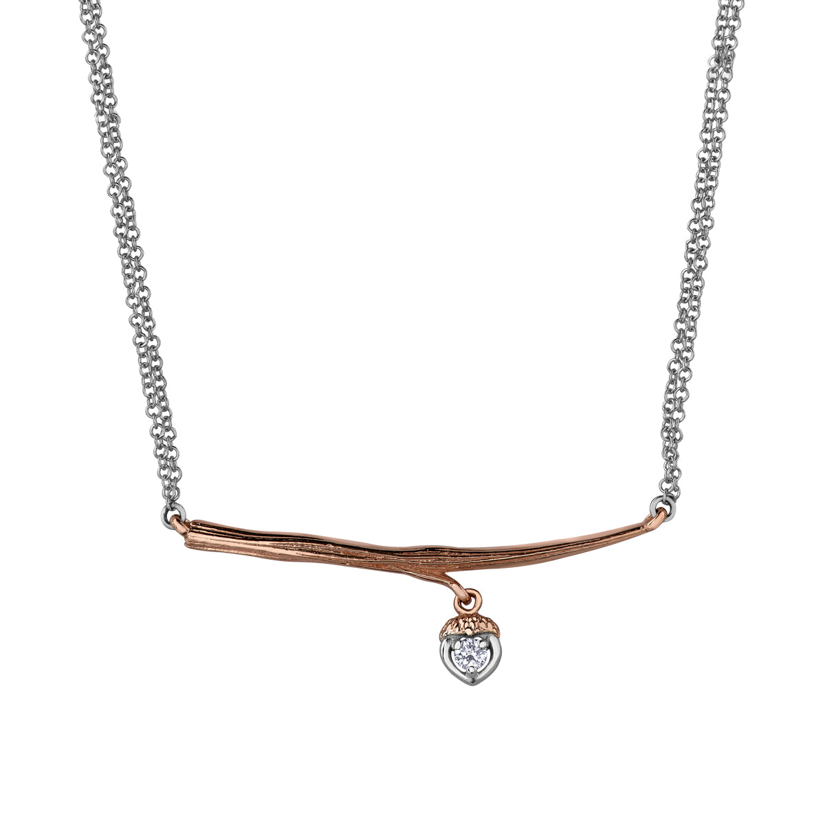Crafted in 14KT rose Canadian Certified Gold, this necklace features a branch with an acorn charm set with a round brilliant-cut Canadian diamond.