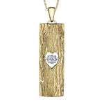 Crafted in 14KT yellow Canadian Certified Gold, this necklace features a tree bark-inspired pendant with a heart-shaped cut out filled with a round brilliant-cut Canadian diamond.