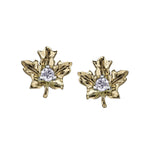 Crafted in 14KT yellow Certified Canadian Gold, these maple leaf stud earrings are set with round brilliant-cut Canadian diamonds.