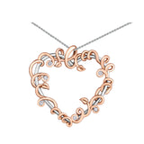 Crafted in 14KT white Canadian Certified Gold, this heart shaped pendant is  wrapped with 14KT rose Canadian Certified Gold vines set with round brilliant-cut Canadian diamonds.