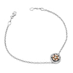 Crafted in 14KT rose and white Certified Canadian Gold, this bracelet features a Newfoundland & Labrador pitcher plant flower set with a round brilliant-cut Canadian diamond