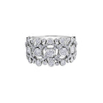 Crafted in 14KT white Certified Canadian Gold, this ring features a swirling design set with round brilliant-cut Canadian diamonds.